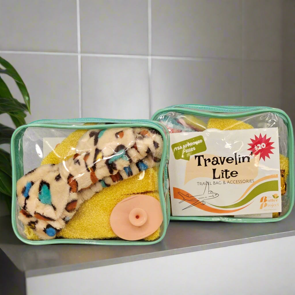 Make a statement with Travelin' Lite Travel Bag with aqua trim