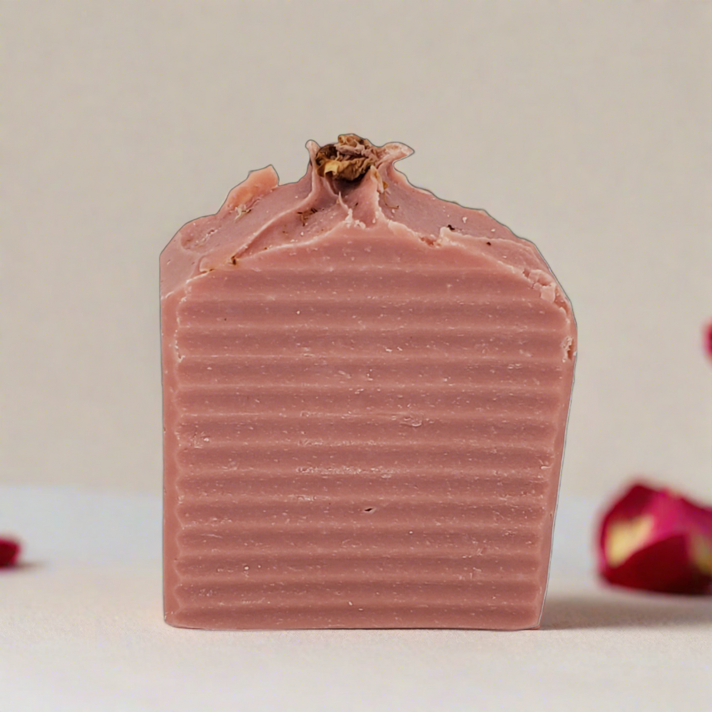 Rose clay formula that gently exfoliates and balances skin's natural oils while reducing redness in this organic bar soap