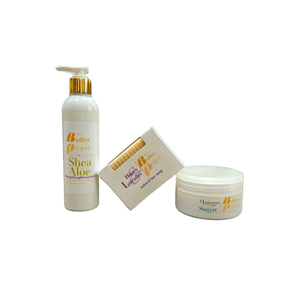 Image of Shea & Aloe lotion, a box of honey & lavender bar soap, and a jar of mango & sugar scrub