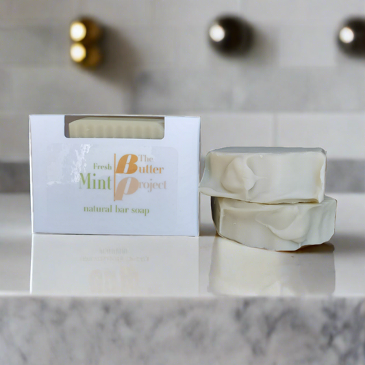 image of box of fresh mint bar soap next to a two bar soap stack