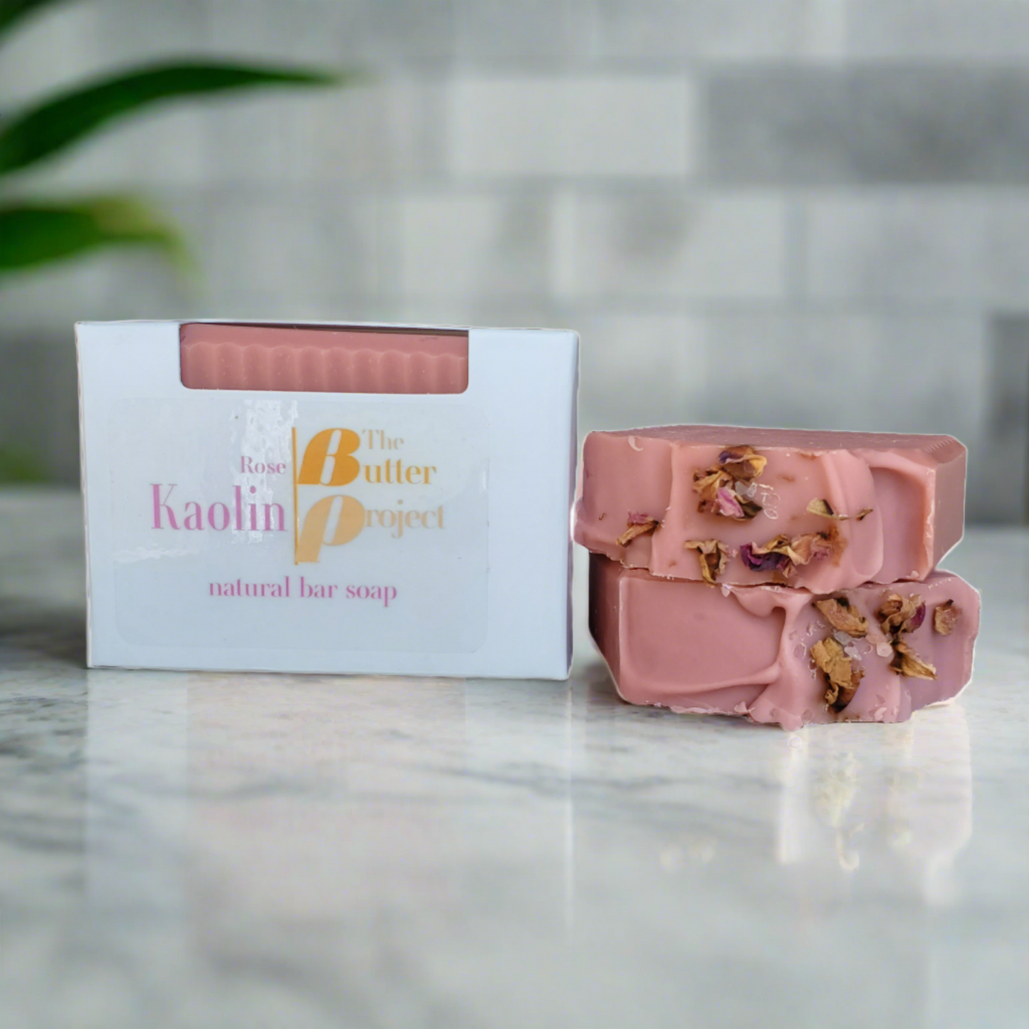 Image of Rose Kaolin Natural Bar Soap box and two Rose Kaolin Natural Bar Soap from The Butter Project.
